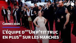 Artus sur les marches avec les acteurs handicapés de son film quotUn ptit truc en plusquot  AFP Images [upl. by Anirt]