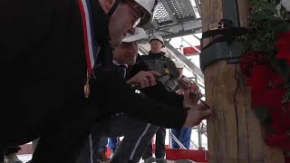 Macron helps engrave General Georgelins name into new Notre Dame spire [upl. by Yecac560]