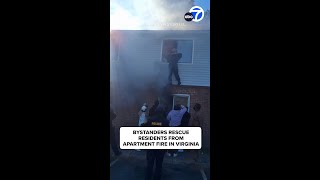 Bystanders rescue residents from burning apartment building [upl. by Lamaj726]