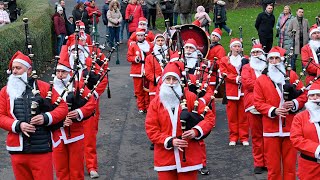 Christmas celebration in Scotland Hundreds of Santas run along to Bagpipe Music [upl. by Hopfinger]