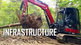 Excavating an 1800 foot trench in a Yanmar ViO55  E132 [upl. by Edmee686]