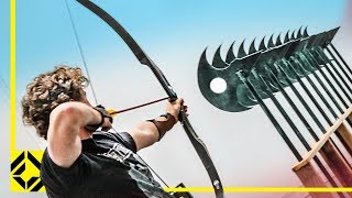 Can You Fire an Arrow through 12 Axes Odysseus Archery Challenge [upl. by Aihseit]