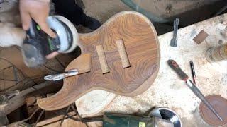 How its made sculpting a bass body with an angle grinder and a half round file [upl. by Ihn]