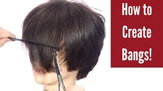 How to Cut Bangs  TheSalonGuy [upl. by Euh459]