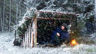 Building a Laavu Shelter to Survive the HEAVY SNOW Winter Camping [upl. by Haskel]