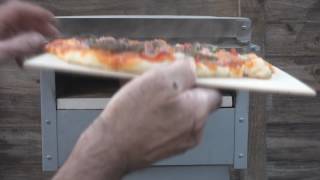 rocket stove First Pizza cook [upl. by Ahsart705]