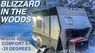 WINTER CAMPING During A BLIZZARD  Wood Stove for Heat  Stuck in Snow with my DIY Travel Trailer [upl. by Aita]