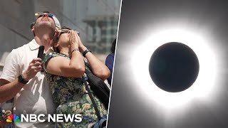 Watch emotional moments as skywatchers view solar eclipse [upl. by Risa]