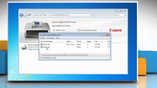 How to cancel a Print command in Windows® 7  Tutorial [upl. by Aihsenrad]