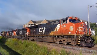 Two Gevos amp Two AC44C6Ms Lead a Long Stack Train CN 120 thru Downtown Moncton NB [upl. by Hanyaz900]