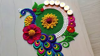 1185 Peacock rangoli designs for diwali  satisfying video  Sand art [upl. by Gavrila671]