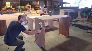 Wood finishing  Spraying lacquer on sapele desks [upl. by Mace315]