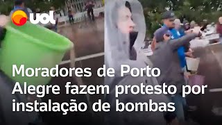 Moradores de Porto Alegre jogam água de enchente em rodovia como protesto por mais bombas vídeo [upl. by Melloney12]