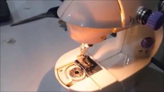 How to use mini sewing machine on threading the machine [upl. by Annohsak]