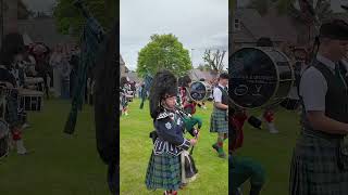 Ballater pipeband marchingband playing on Tomintoul Green in cairngorms Scotland shorts [upl. by Dove]