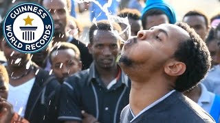 Longest Time To Spray Water From The Mouth  Guinness World Records [upl. by Yerggoeg]