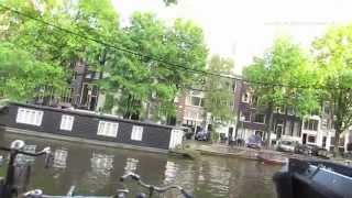 Walk past the Amsterdam Coffee Shops and along the Singel Canal in Holland [upl. by Ylrbmik]