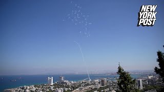 Hezbollah fires over 100 rockets at Israeli civilians in Haifa [upl. by Zeta552]