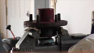 How to install a wheel bearing and grease seal in a trailer hub [upl. by Seena]