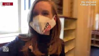 WATCH Lisa Desjardins reports from inside US Capitol where proTrump mob interrupts vote count [upl. by Wolfgang387]