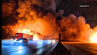 Massive Fire Engulfs Pallet Yard and 10 Freeway in Los Angeles [upl. by Xirtaeb]