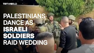 Palestinians dance as Israeli soldiers raid wedding [upl. by Aihsak916]