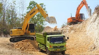 Excavator loading Topsoil [upl. by Ruyle]