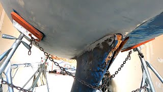 Sailboat Refit 18 fiberglassing and fairing the keel to hull joint before bottom paint [upl. by Eimmij620]