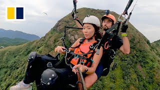 Paragliding offers birds eye view of Hong Kong [upl. by Sydney921]