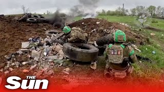 Firstperson body cam shows Ukrainian soldiers firing rifles from trenches of Bakhmut [upl. by Yrac3]