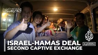 Hamas releases 13 Israeli four Thai captives after hourslong delay [upl. by Ydnac]