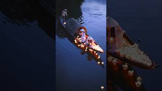 On the tranquil waters of Hue’s Hong River in Vietnam women perform the sacred Candle Flower ritual [upl. by Nuawaj]