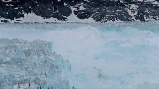 Glacier Timelapse Watch a Manhattansized glacier break into Greenland seas [upl. by Notneiuq]