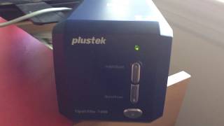 Plustek Opticfilm 7400 Demo Powering on [upl. by Tnilk]