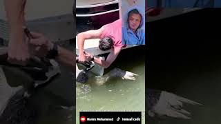 Pelican gets a fish stuck in his throat and a man rescues him Must see it now sealife seafood [upl. by Amelus]