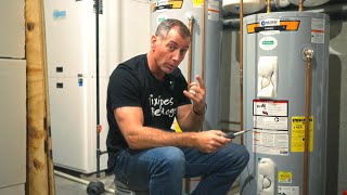 How do I adjust the temperature on my electric water heater  A master plumber explains [upl. by Bach]