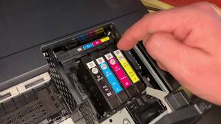 How to replace Epson WorkForce printer ink cartridge change cartridges Epson multifunction device [upl. by Idhem]