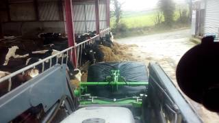 Rohan Bale Slice feeding cows in Ireland [upl. by Noemad]