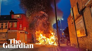 Police car turned over and vehicles set alight in Leeds unrest [upl. by Deppy987]