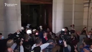 Protesters Against Renewed COVID19 Restrictions Invade Serbian Parliament [upl. by Llennehc663]