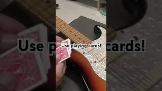 Use playing cards to measure guitar string height [upl. by Kihtrak]