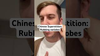 Rubbing earlobes  Chinese superstition 24 [upl. by Oeak]