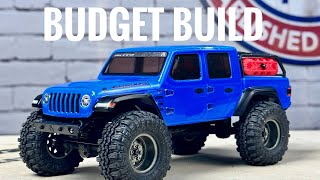 SCX24 BUDGET BUILD – Building a BEAST for 100 Upgrades Installation Free Mods amp More [upl. by Oibaf]