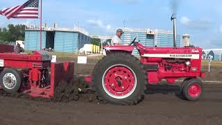 10700lbs turbo farm stock class at the Nickerson Farmers Tractor Pull Classic with a 1968 IH 1256 [upl. by Nagiam]