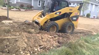 Cat 262 skid steer pushing dirt [upl. by Av]