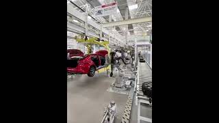 Installing wheels in a car factory with the help of robots [upl. by Oecile]