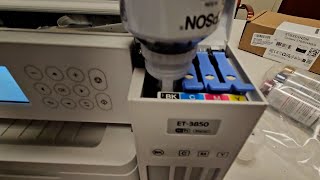 Filling the Epson EcoTank ET 3850 Wireless Color Supertank Printer with ink [upl. by Wendelin]