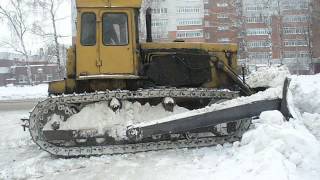 Old soviet dozer on T170B tractor pushinquot snow off the road [upl. by Nireil]