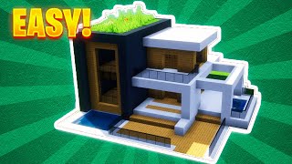 Minecraft How to build an Easy Modern House 10 [upl. by Ellesij]