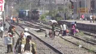 Indian RailwaysSimultaneous Arrival amp Departure at a busy Karjat station [upl. by Harned183]